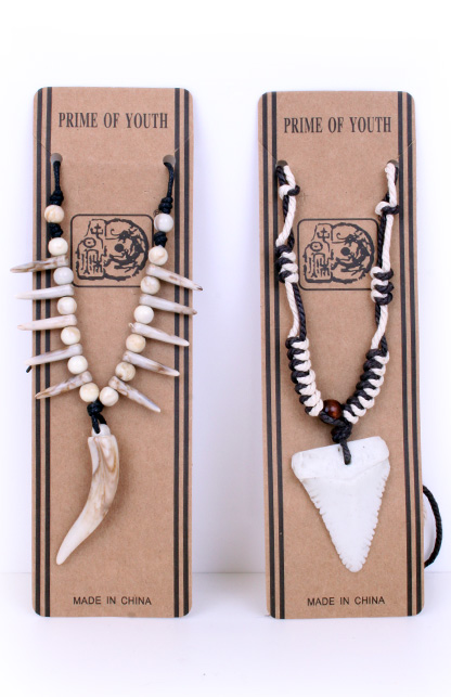 2 Assorted indian necklaces with teeth